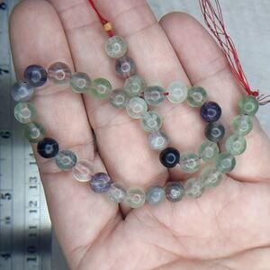 $💲$ 6mm Fluorite 8in Strand #11